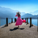 Beautiful girl walking at Sun Moon Lake in Taiwan.